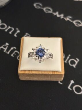 Sterling Silver Blue Halo Ring with Clear Accents